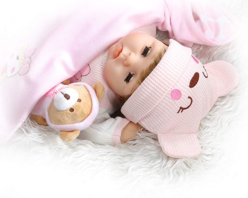 Muneca Reborn Realista para Nina con Ojos Parpadeantes Cuerpo Ponderado Vinilo de Silicona de 22 Pulgadas - Imagen 7