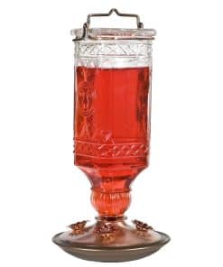 Comedero de colibrí de botella de vidrio antiguo Perky-Pet