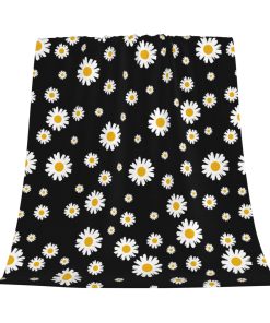 Manta de tiro negra con flores margaritas blancas y