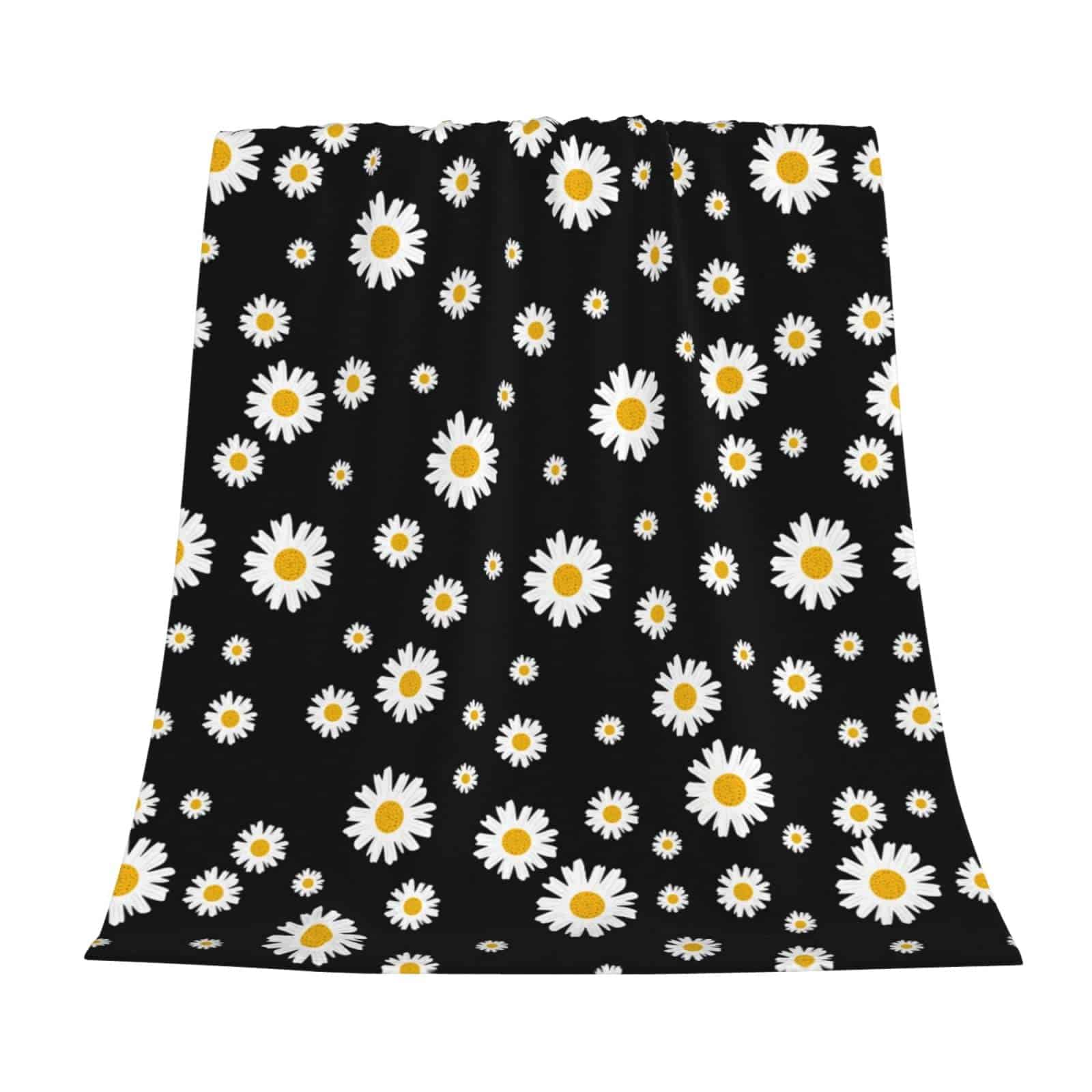 Manta de tiro negra con flores margaritas blancas y