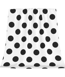 Manta de lunares negros y blancos. Suave y acogedora manta