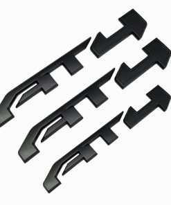 Juego de 3 Emblemas AT4 Sierra 3D para Puerta Lateral