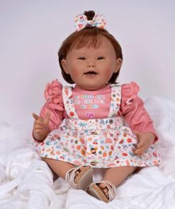 Muñeca realista de niña para la conciencia del Síndrome de