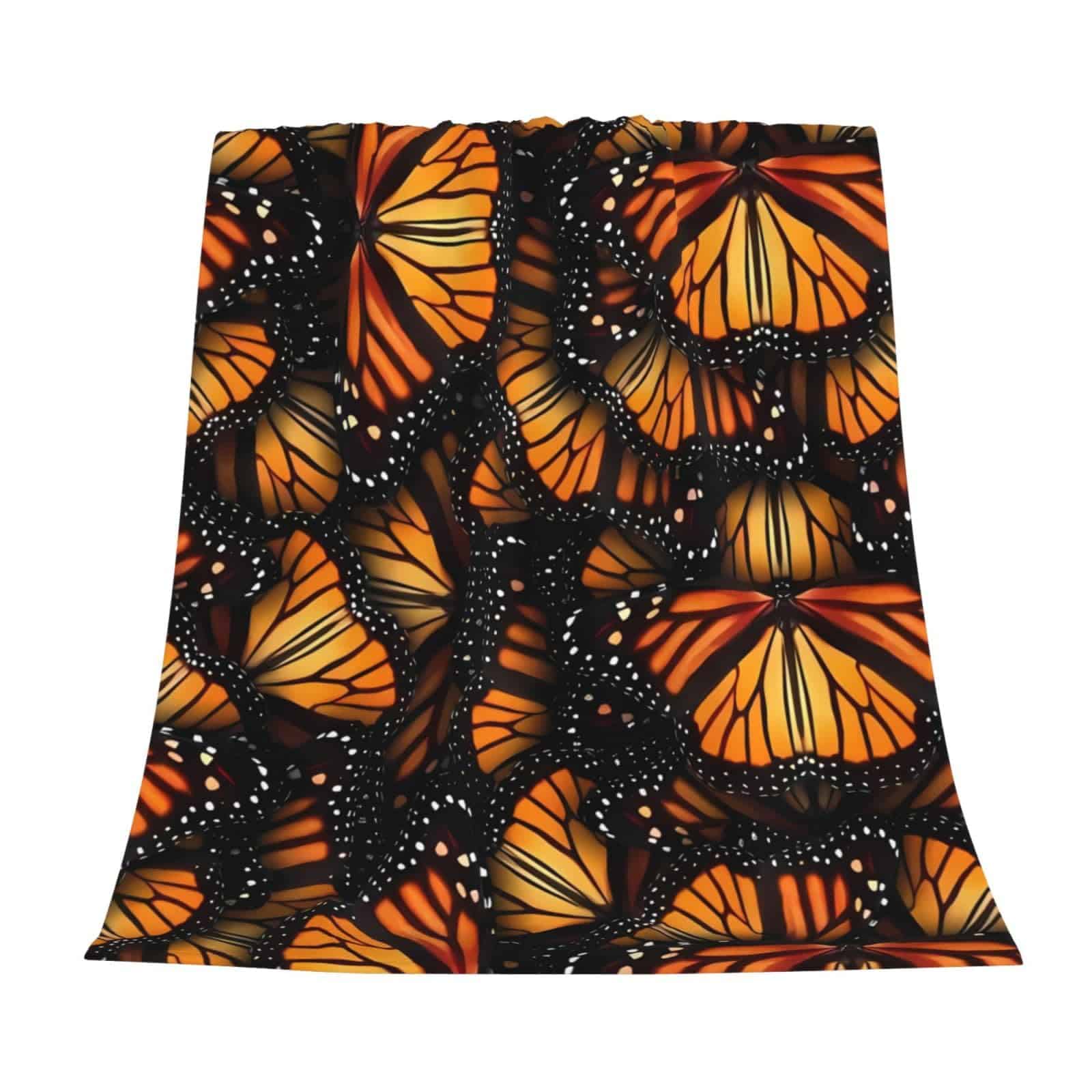 Manta de franela con mariposas monarca naranjas para sofá