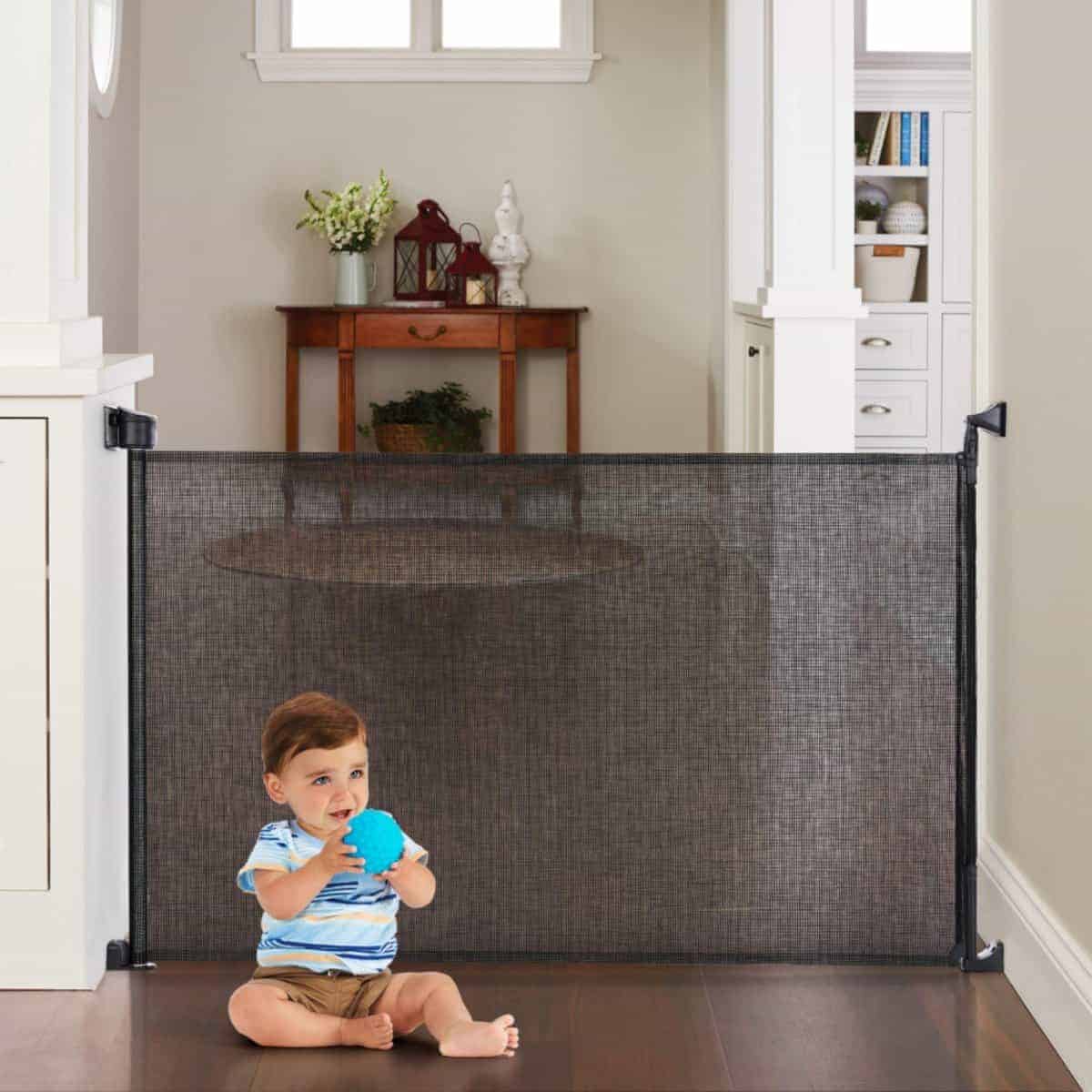 Puerta de malla retráctil Toddleroo by North States: Extra