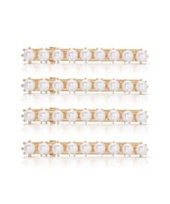 Clips para el cabello de Ettika. Bañados en tono dorado,