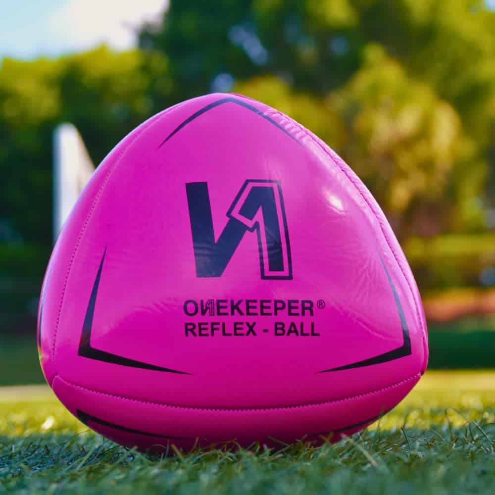 Pelota de reflejo y reacción de fútbol ONEKEEPER - Rosa