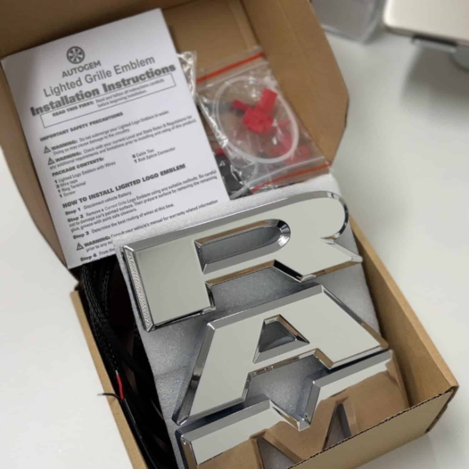 Emblema de parrilla iluminado Autogem 2019-23 RAM, cromado - Imagen 6