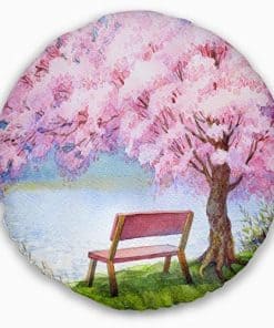 Funda de cojín decorativa 'Banco bajo árbol de durazno en