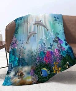 Manta de lanzamiento del mundo submarino con delfines y