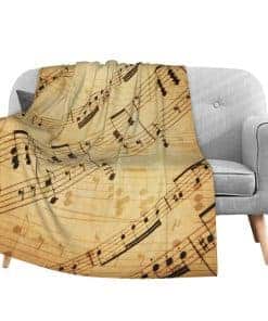 Manta de franela con estampado de partituras de música